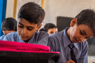 Two students at work in a Class VII lesson